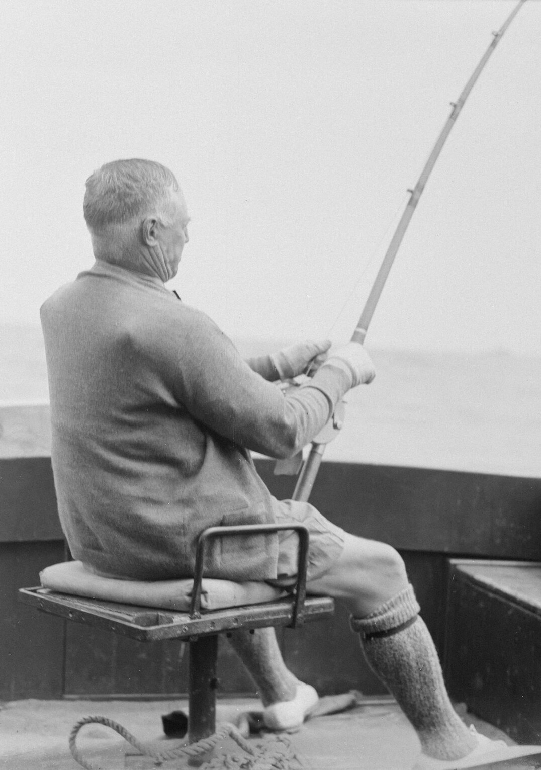 elderly man fishing
