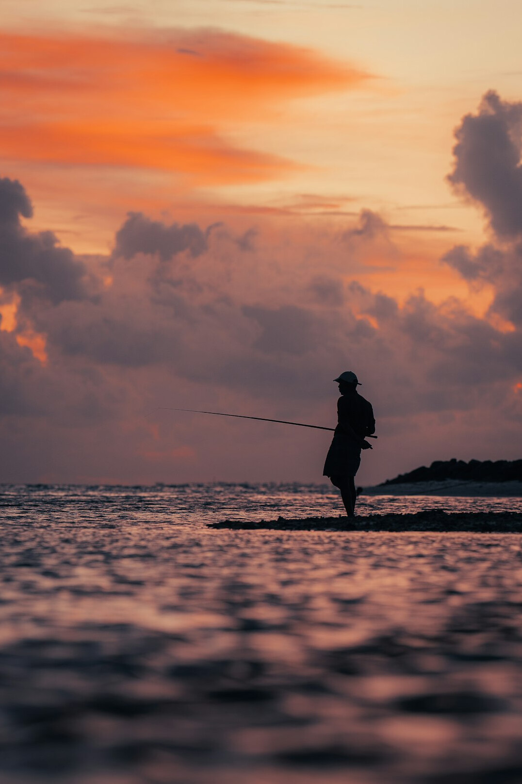 fisherman at sunset