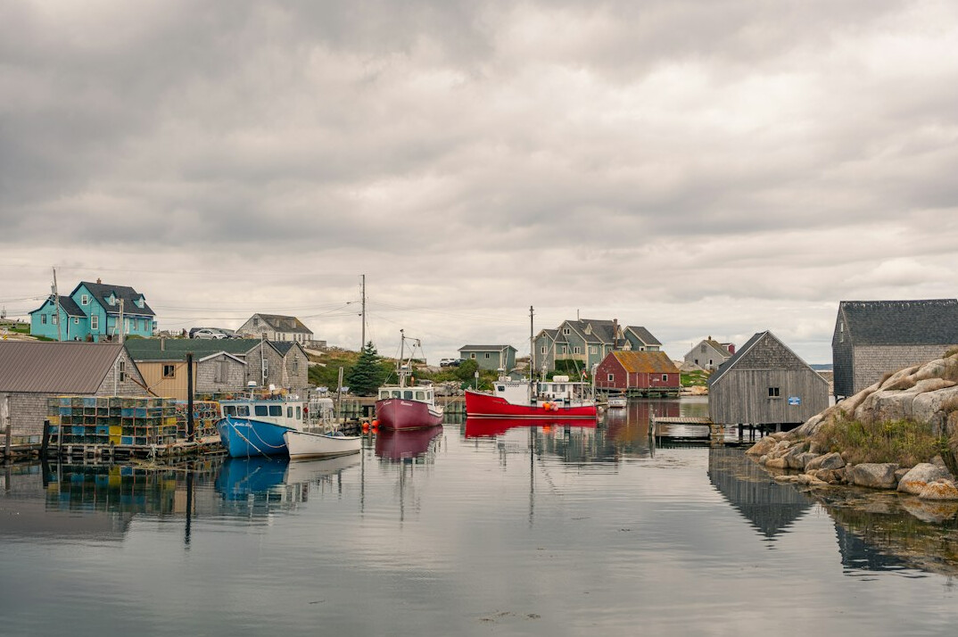 Fishing boats docked in a small harbor village in northern Denmark