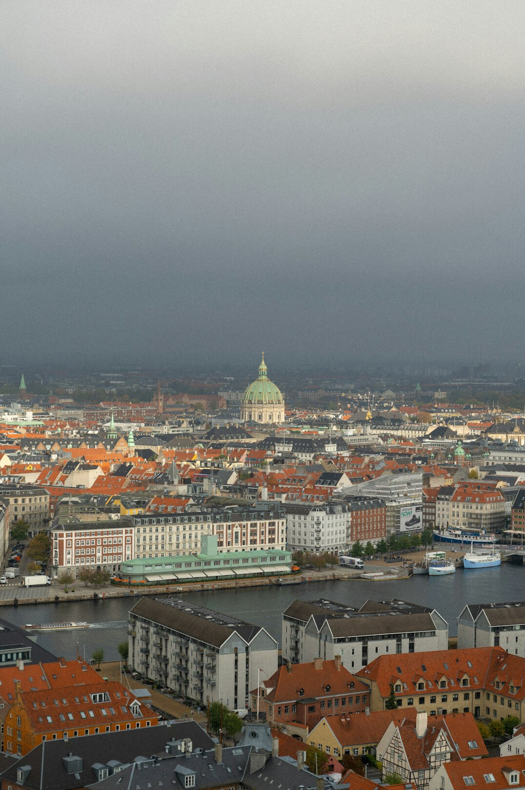 Aerial view of central Copenhagen rooftops and canals