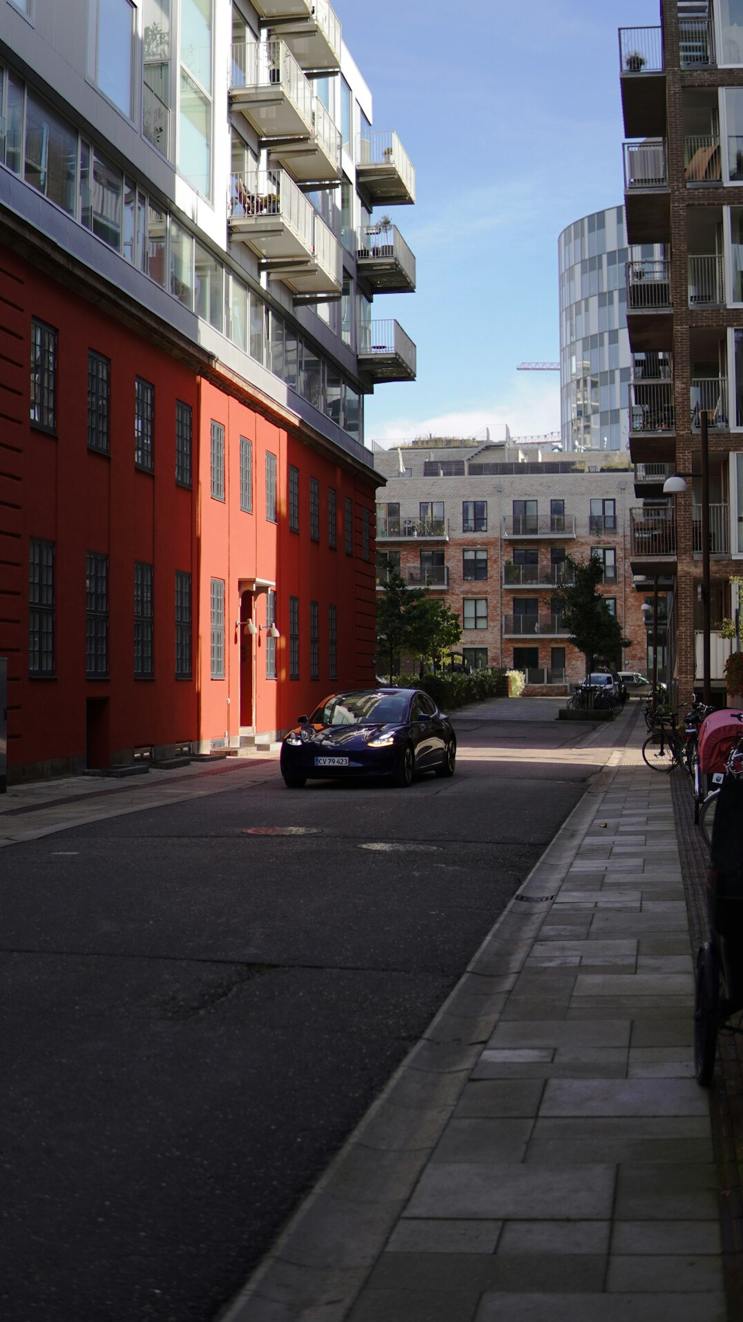 Children playing in a quiet residential Danish street